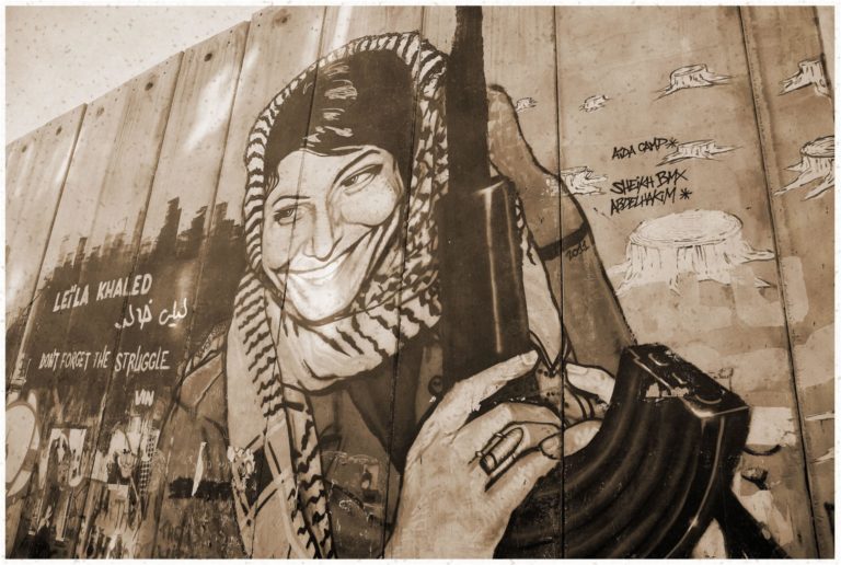Leila Khaled graffiti on the Israeli West Bank barrier near Bethlehem